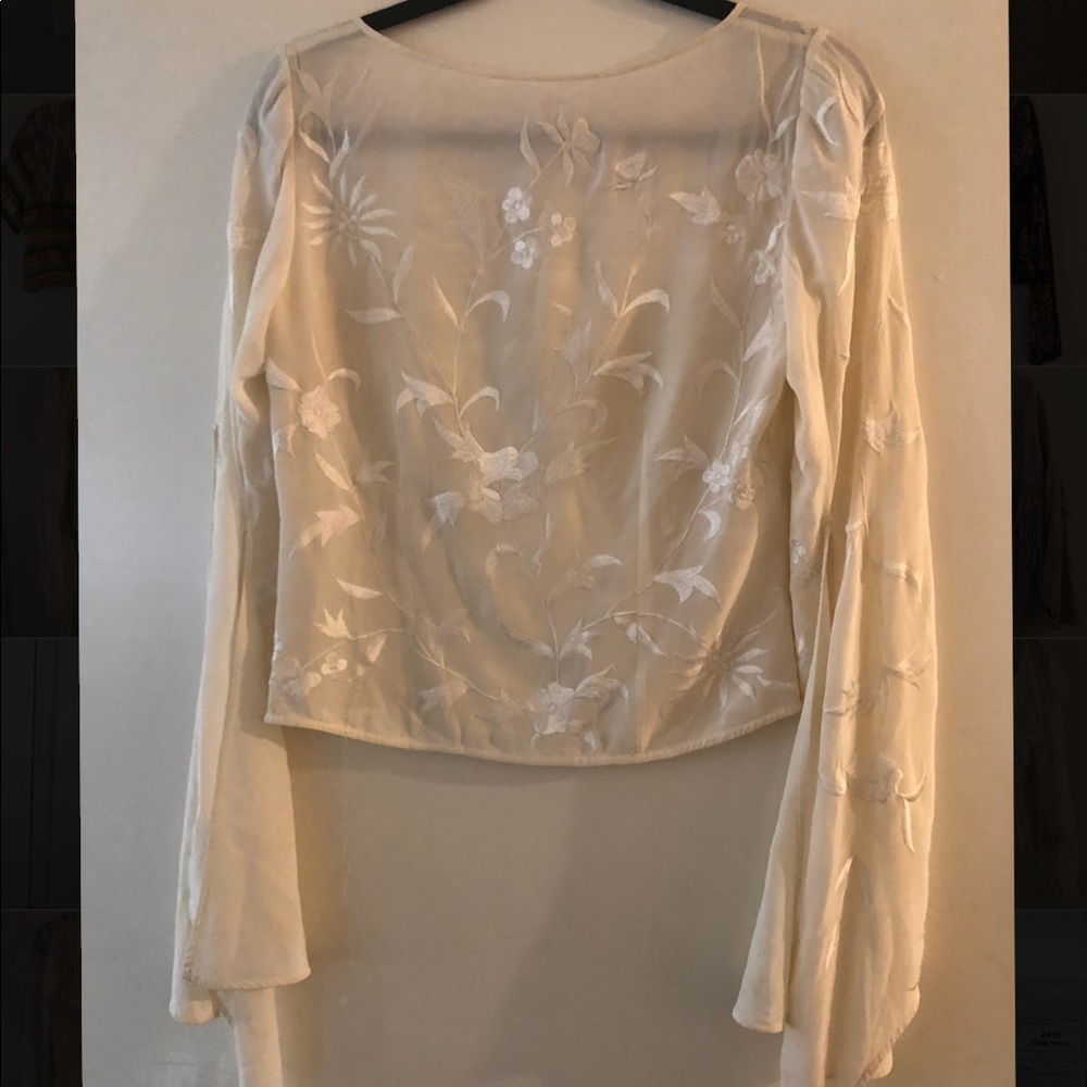 Vintage cream motif flare arm blouse